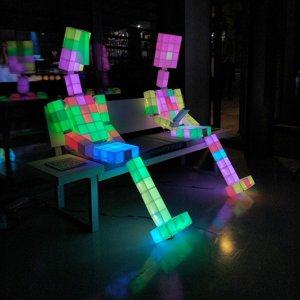 “8bit Human” is a series of interactive light sculptures with a voxel structure and the light cubes/pixels of the 8 primary colors of the 8bit computers.